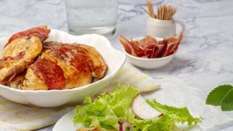 Chicken Saltimbocca, a lightened-up version of the Italian veal classic, served on a dish.
