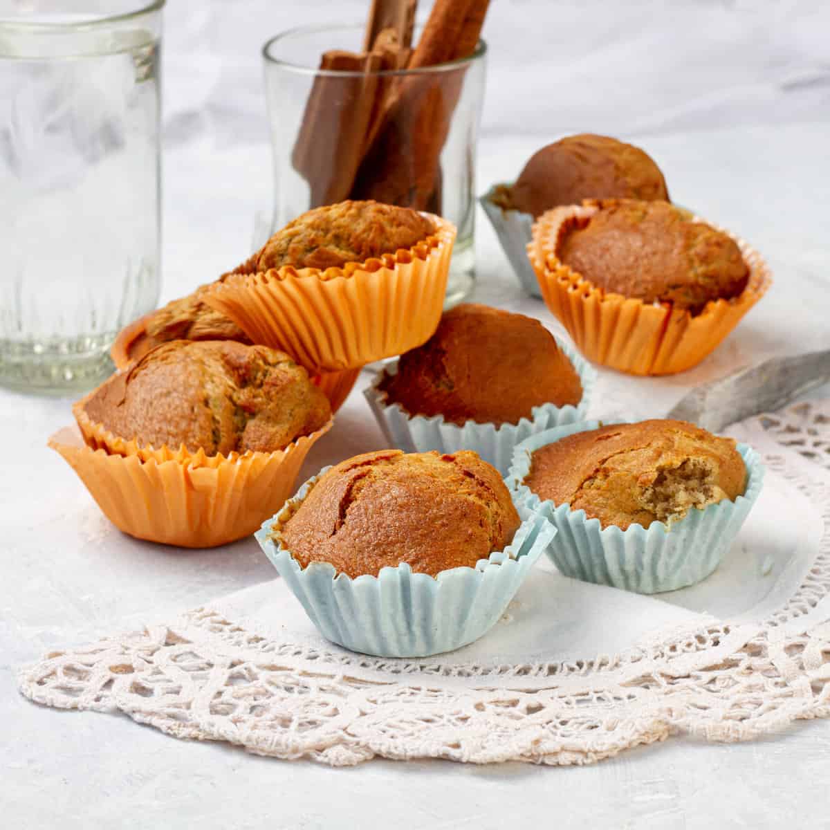 Warm and naturally sweetened Weight Watchers Cinnamon Muffins arranged on a plate.