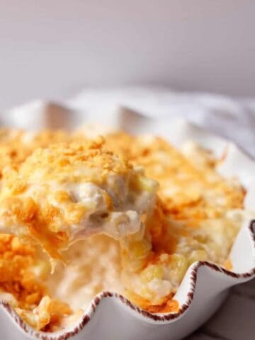 Creamy Corn Casserole in white casserole dish.