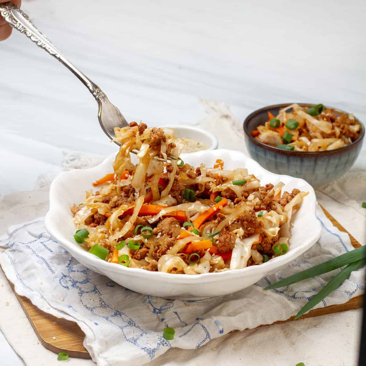 Chinese-American egg roll in a bowl dish.