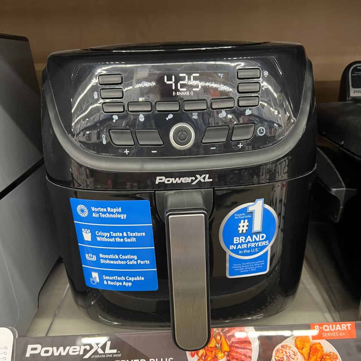 PowerXL Air Fryer sitting on shelf at store