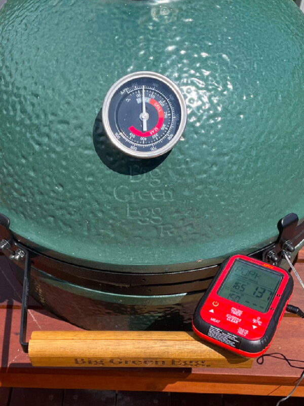 meat thermometer outside a big green egg