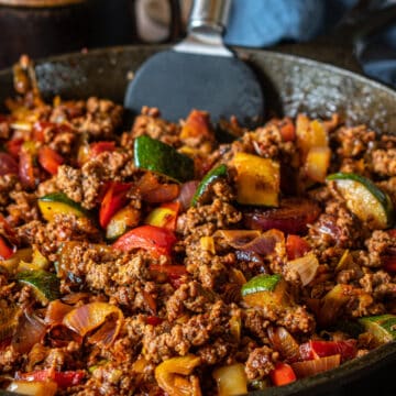 cooked ground elk with vegetables in a pan