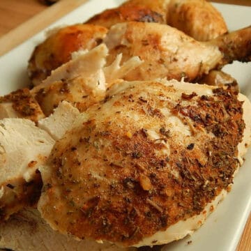 crockpot roasted chicken on white plate