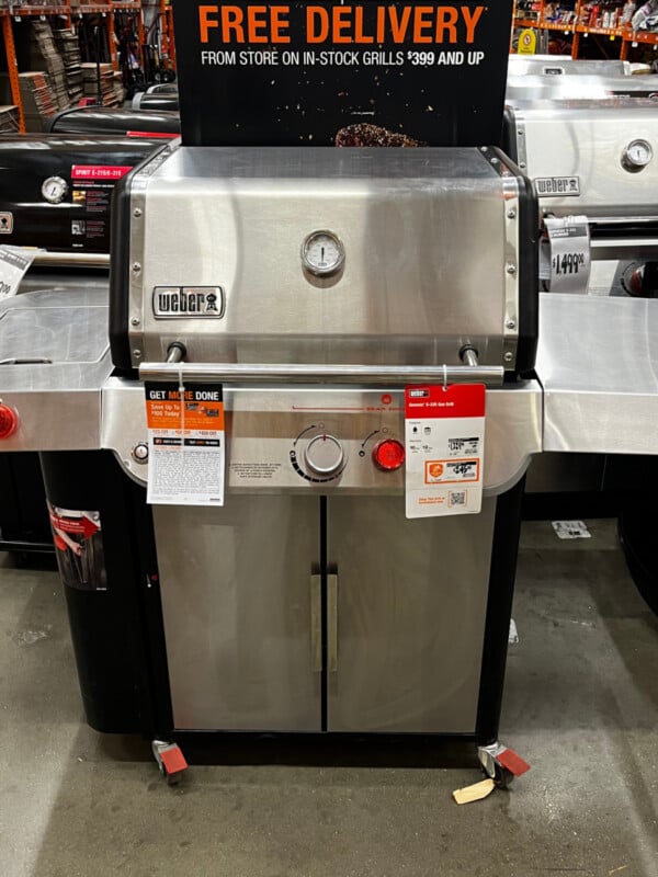 weber stainless steel gas grill on display