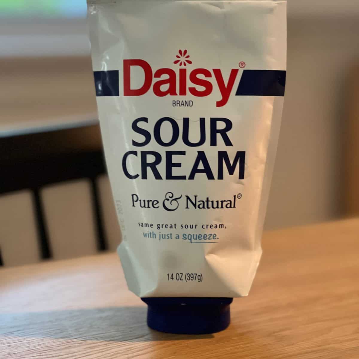 sour cream sitting on table
