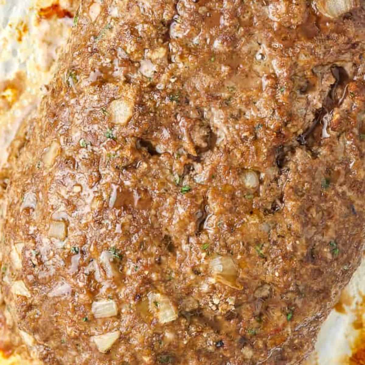 cooked meatloaf after coming out of oven