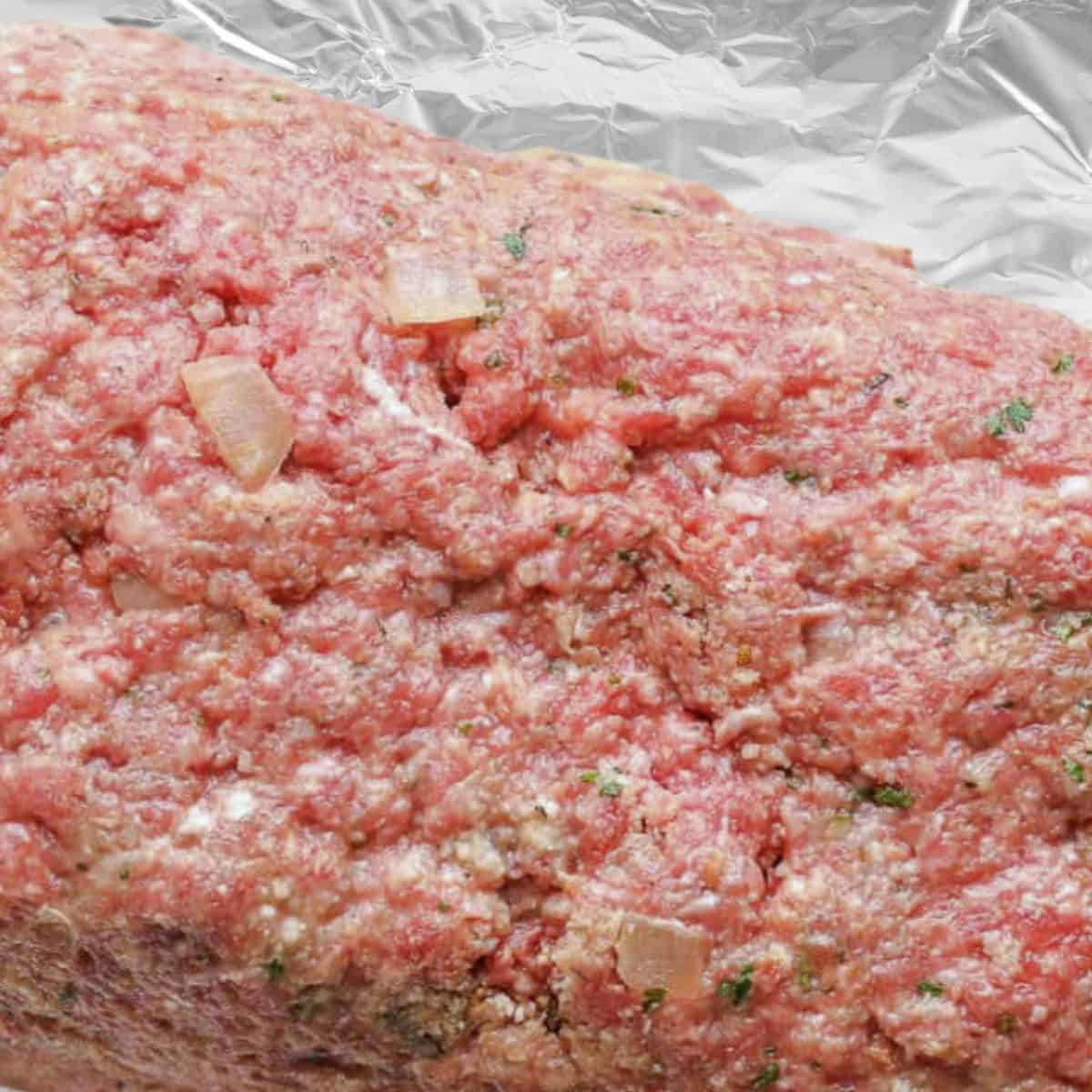 uncooked meatloaf ready for the oven