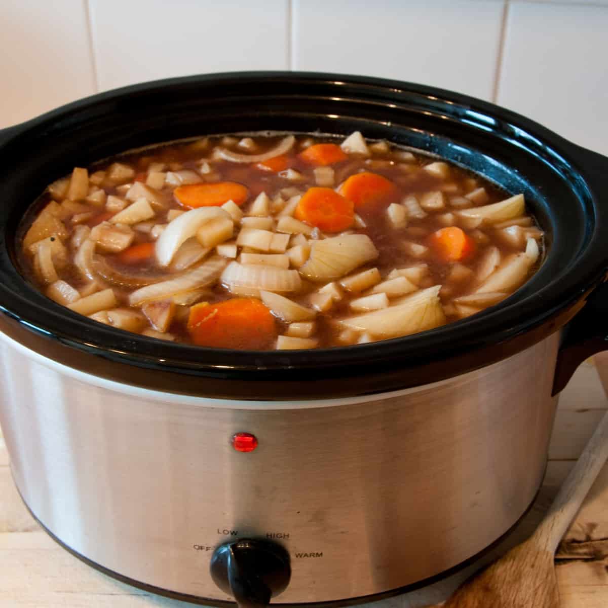Slow cooker cooking Scouse