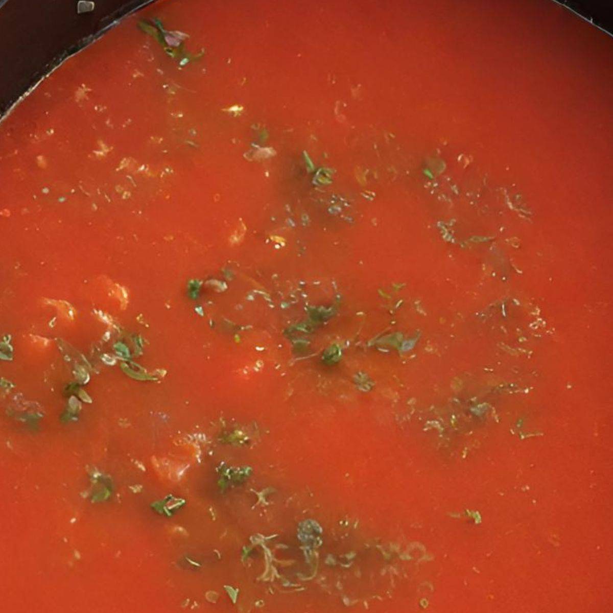 tomato sauce for Ina Garten meatloaf in black pot