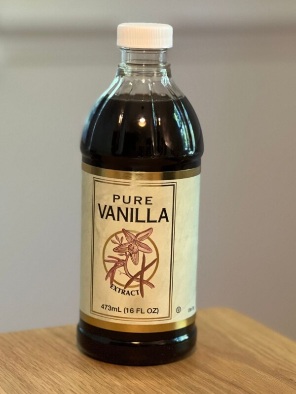 Vanilla extract on wooden table