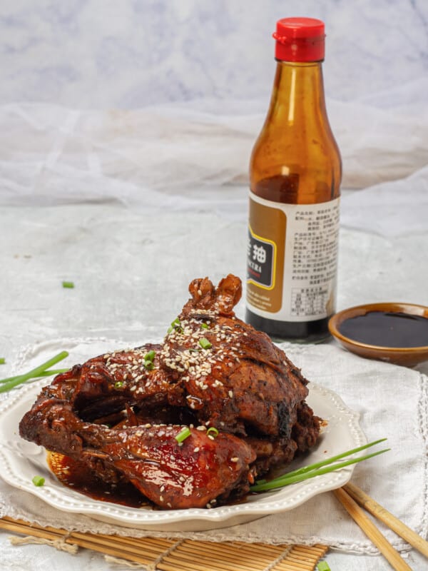 Filipino Chicken Adobo served with sauce and wine