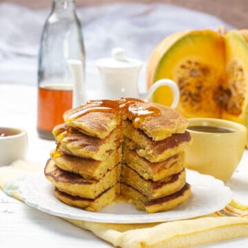 Honey flowing over Pumpkin Pancakes stack