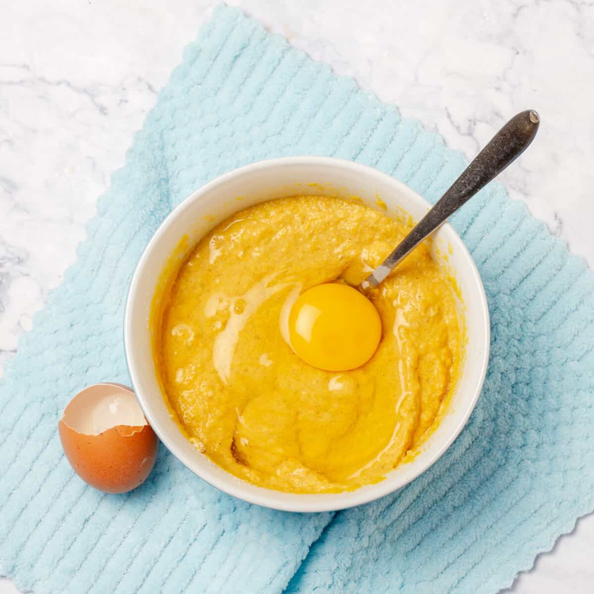A bowl of pumpkin pure and egg 