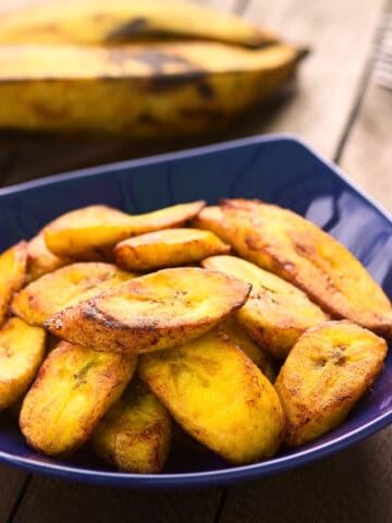 fried plantains in blue bowl