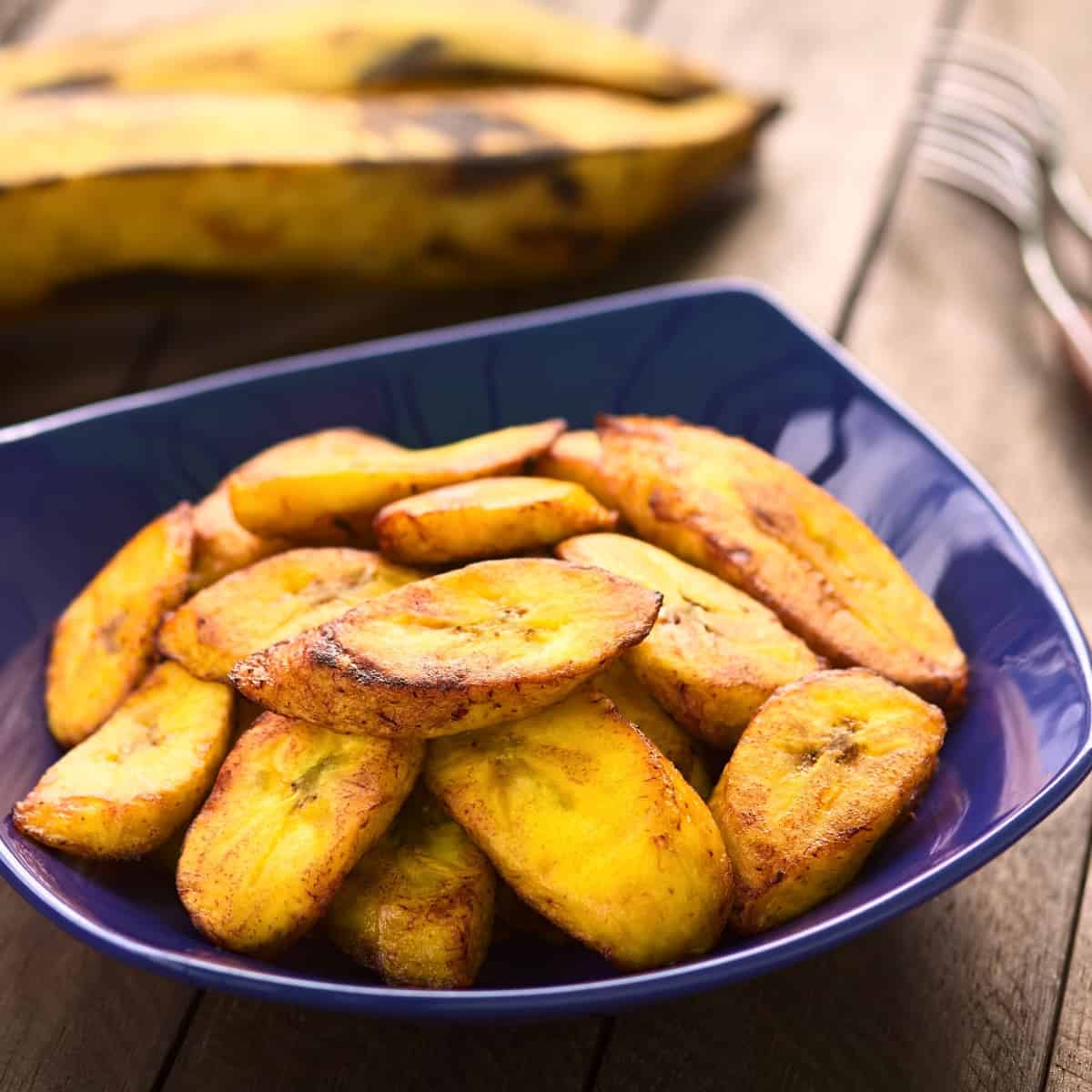 fried plantains in blue bowl