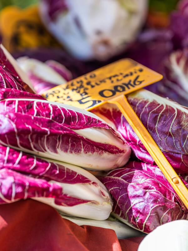 Red raddichio on display in campo de fiori farmers market in Italy.
