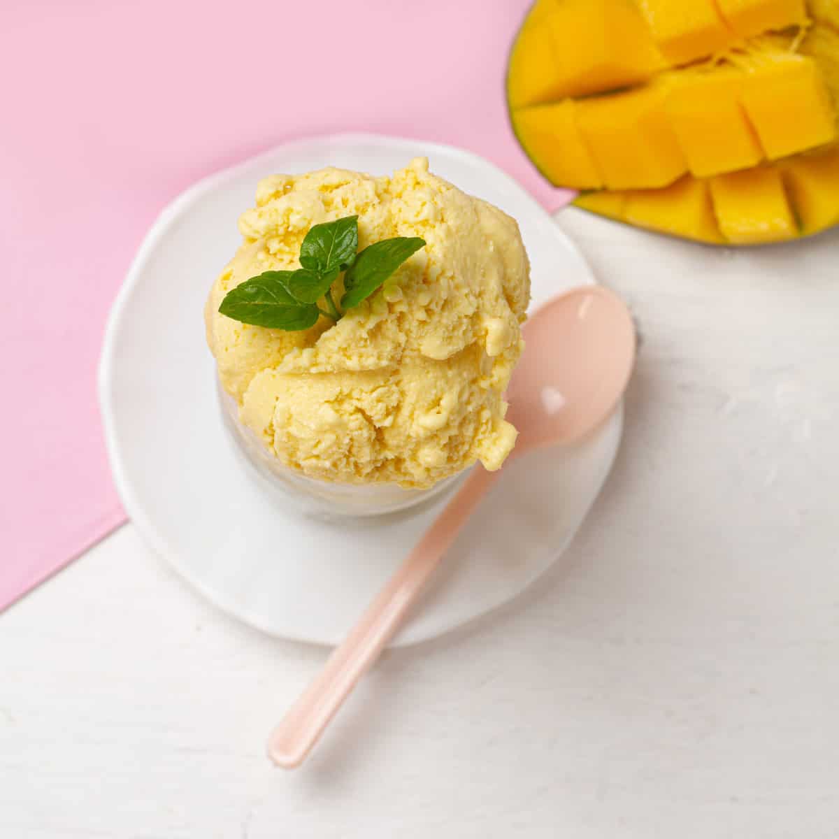 Creamy Mango and Coconut Ice Cream served in a bowl
