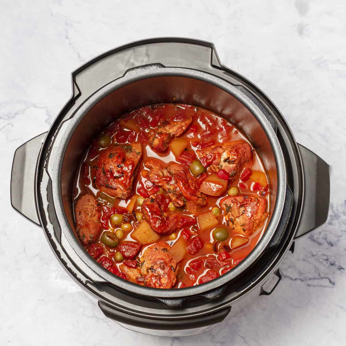 Tomato Paste and diced tomatoes cooking in instant pot