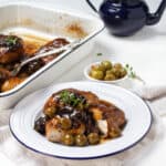 Chicken Marbella served in a tray and plate