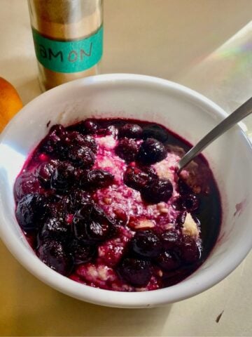 Creamy buckwheat porridge with warming spices and homemade blueberry compote.