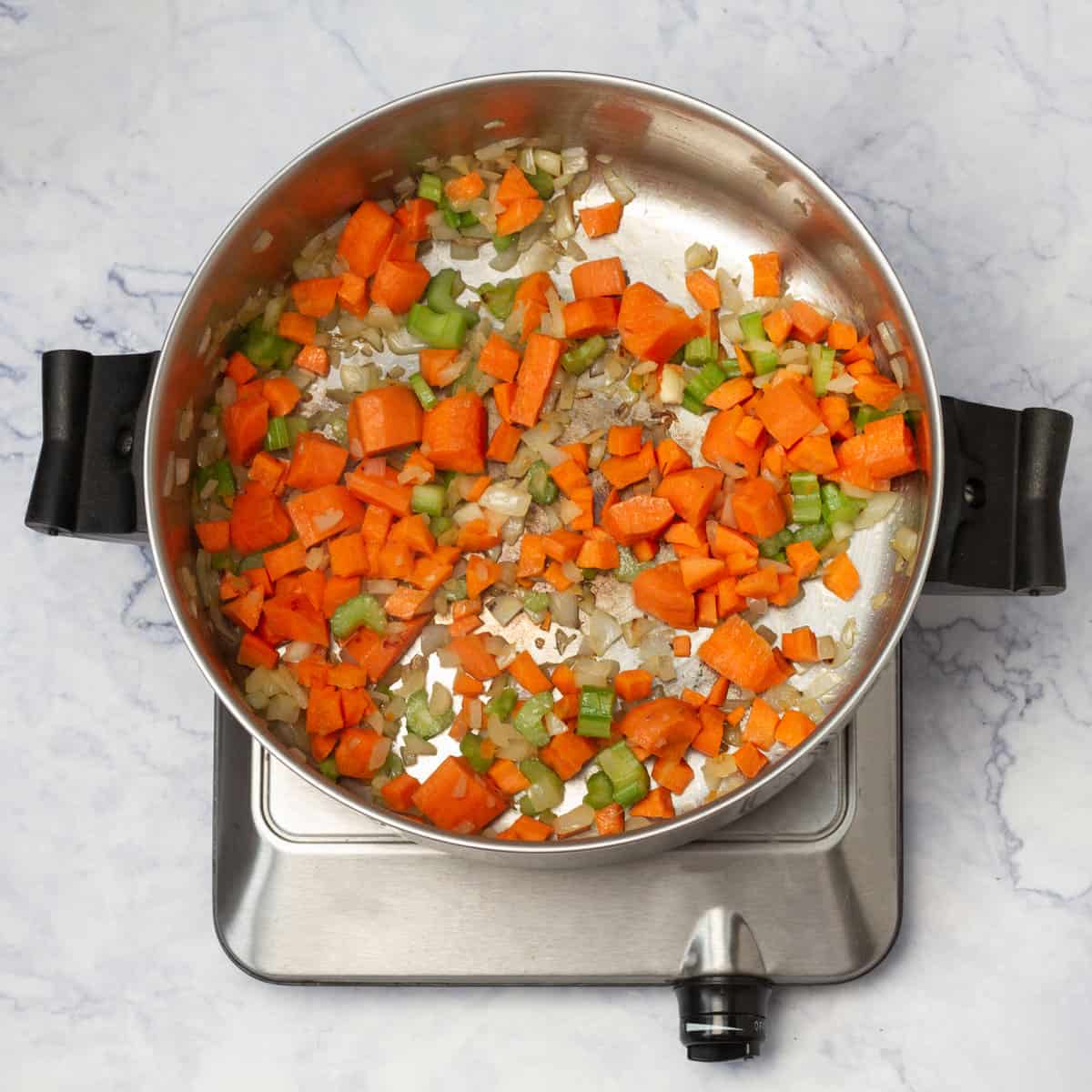 Cooking vegetables in a saucepan