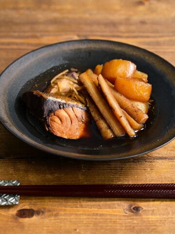simmered yellowtail, radish and burdock in a bowl