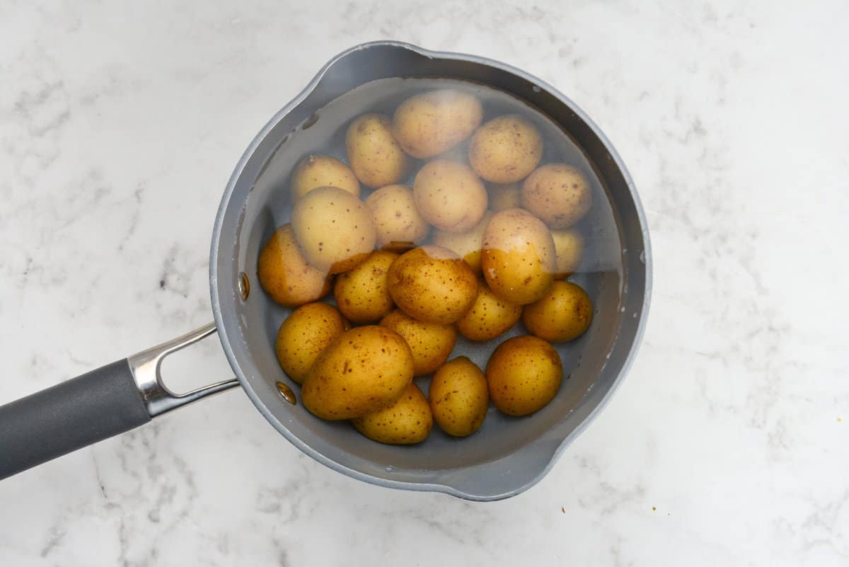 baby potatoes in a pot with water and salt.