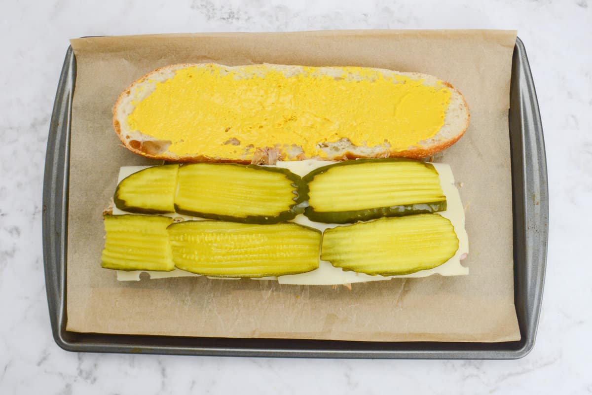 Pickle slices added to Blackstone Cuban Sandwich construction.