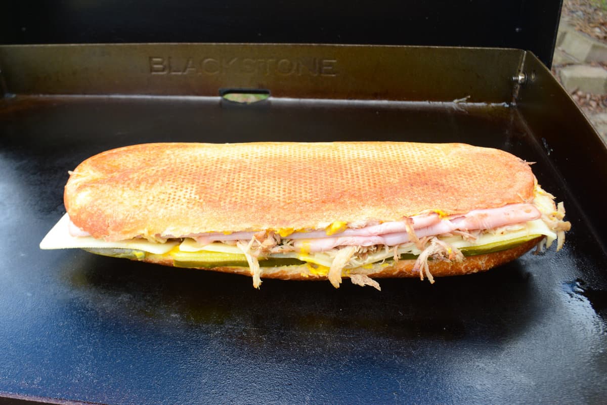 Cuban sandwich flipped to show even Blackstone cooking on both sides. 