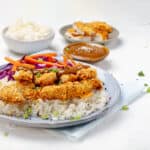 Chicken Katsu platted with a bowl of rice