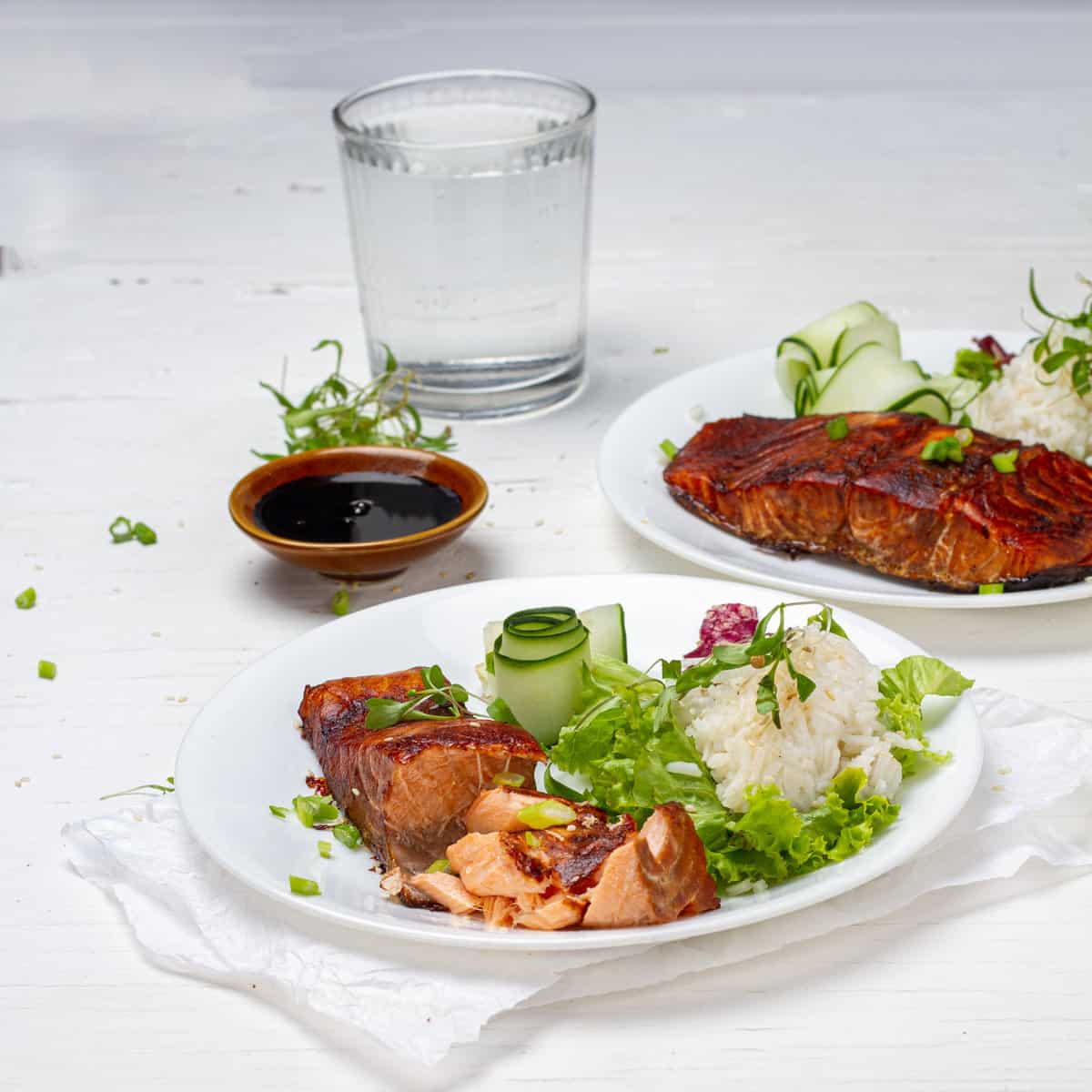 Miso Salmon served in a plate with sauce