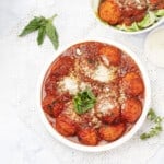Pesto Chicken Meatballs in a bowl and plate