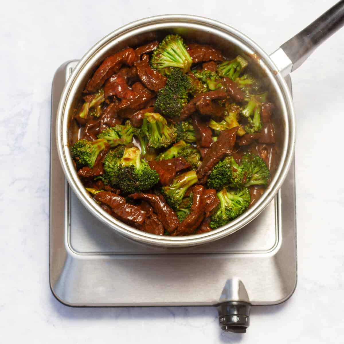 cooking beef in the skillet, along with the blanched broccoli florets