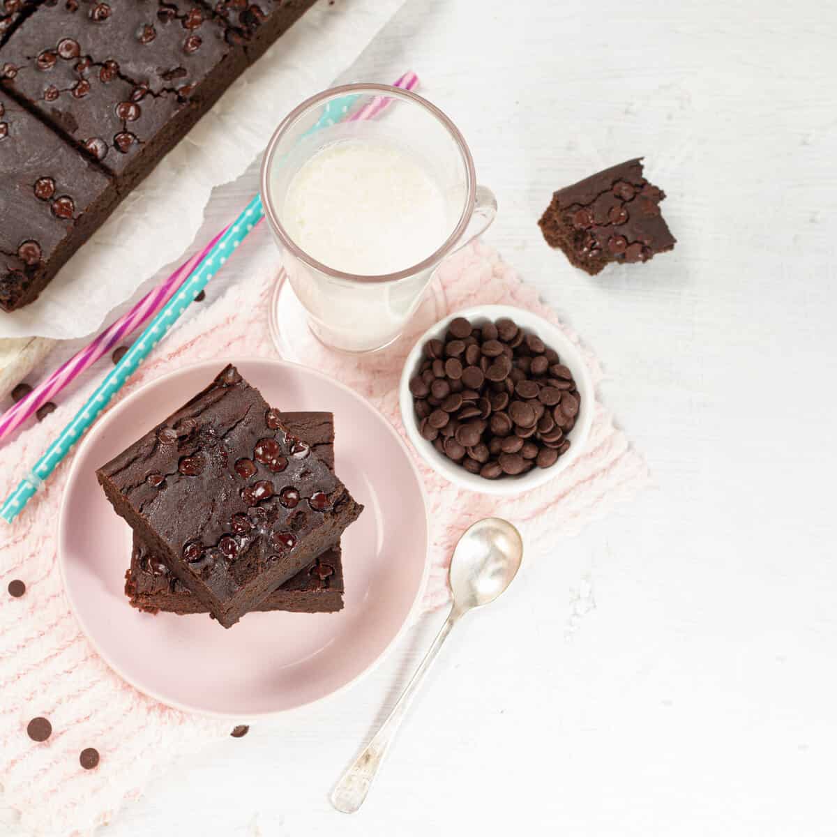 Blender Black Bean Brownies served in a plate with milk glass