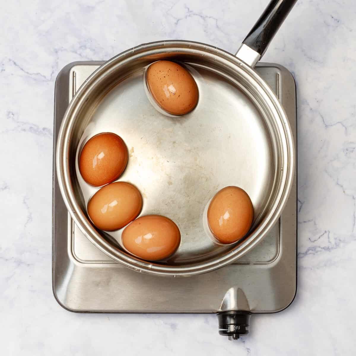 Cook the eggs in skillet