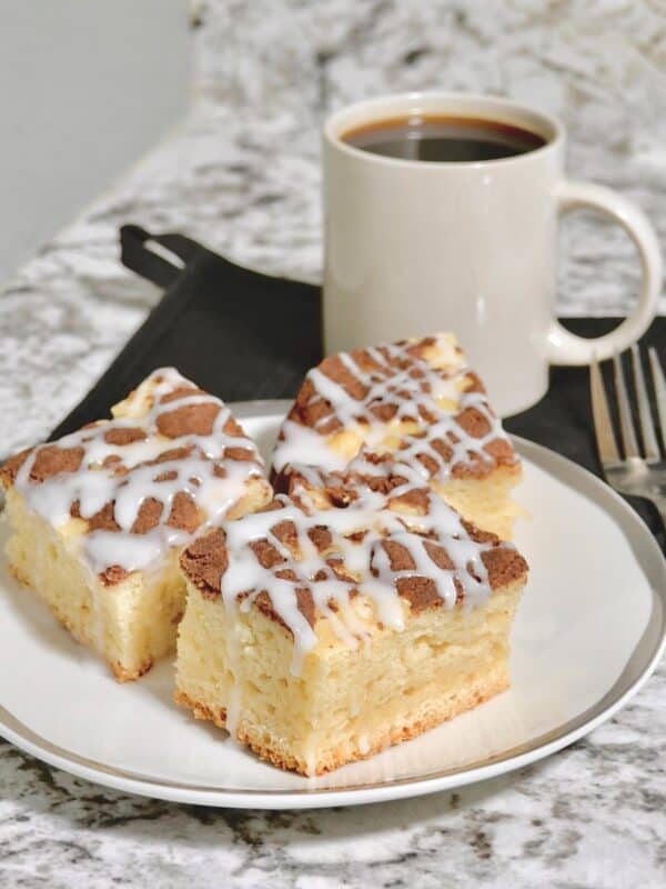 Cup of coffee with cinnamon streusel cake