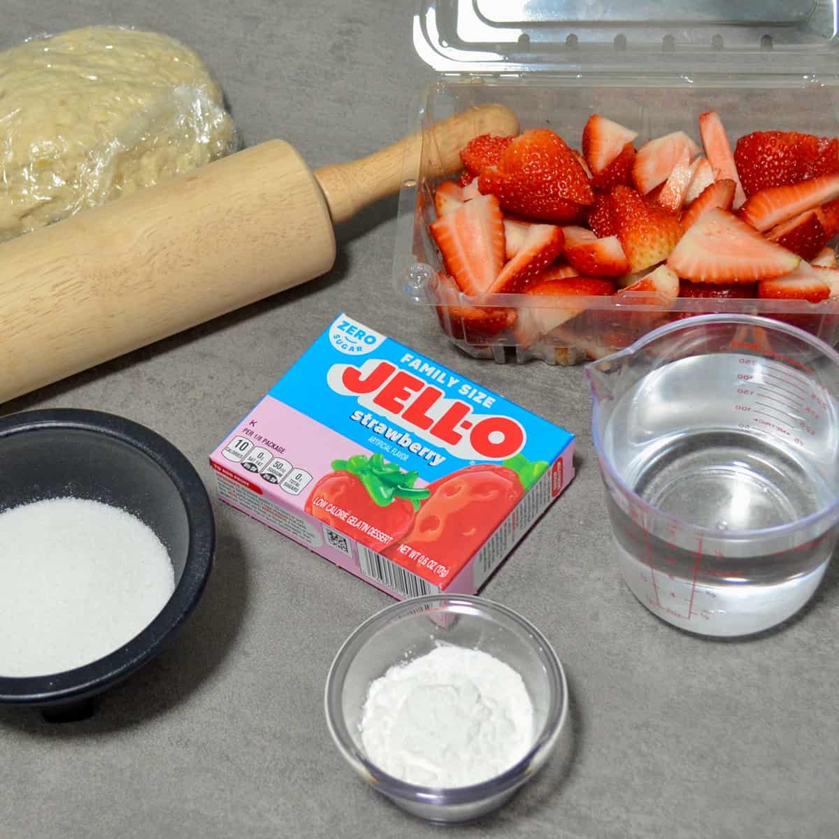 Jell-O mix, strawberries, and other baking ingredients