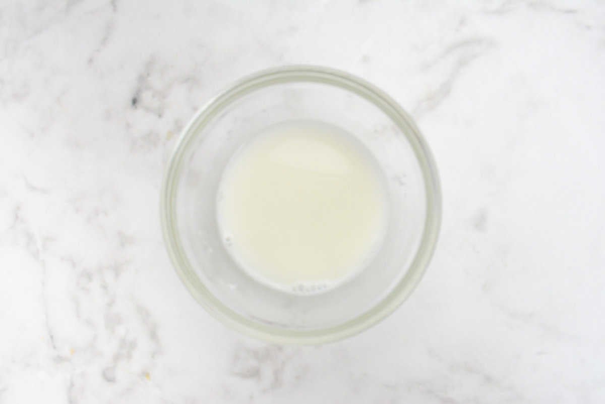 A small clear bowl filled with a white slurry