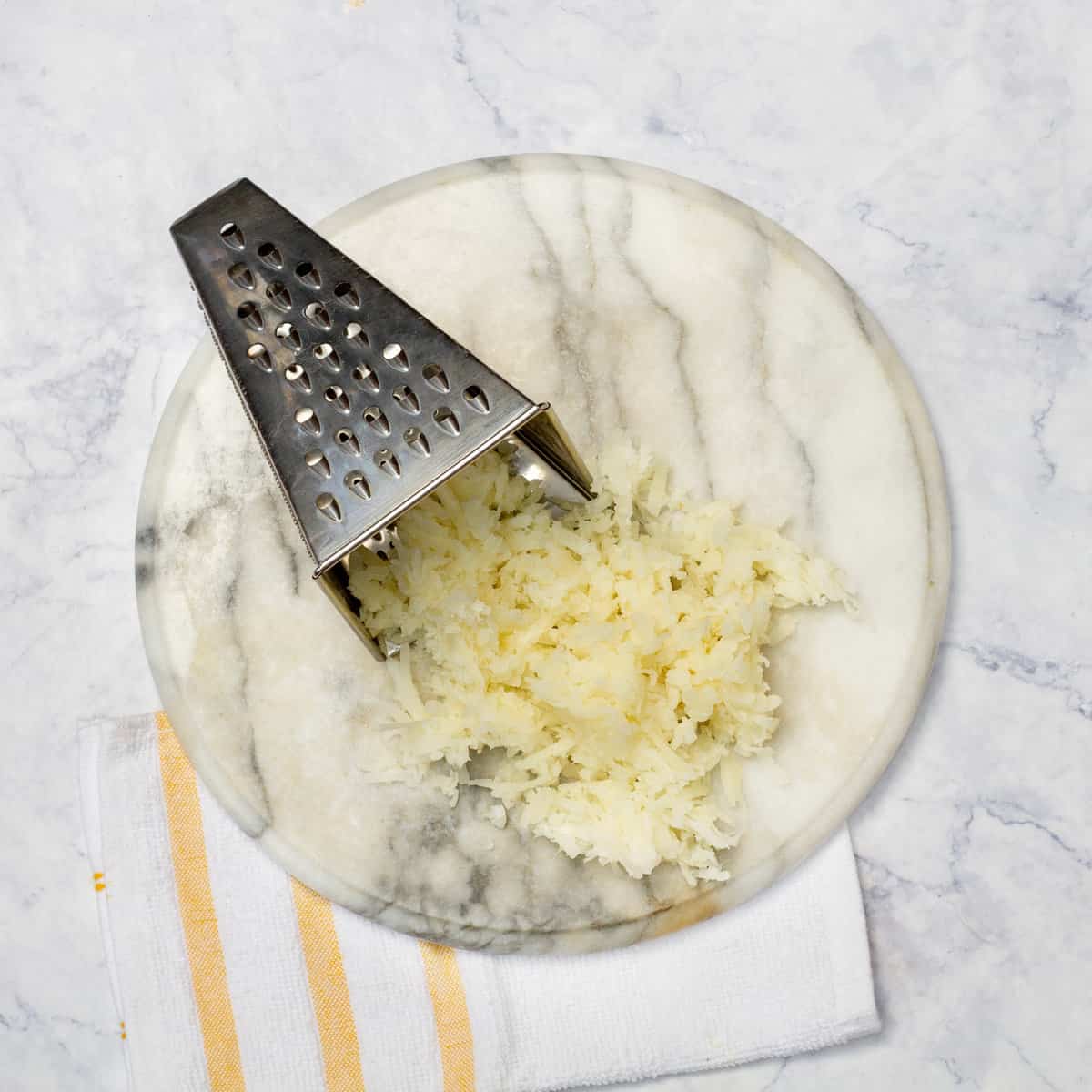 grate the cooked yuca