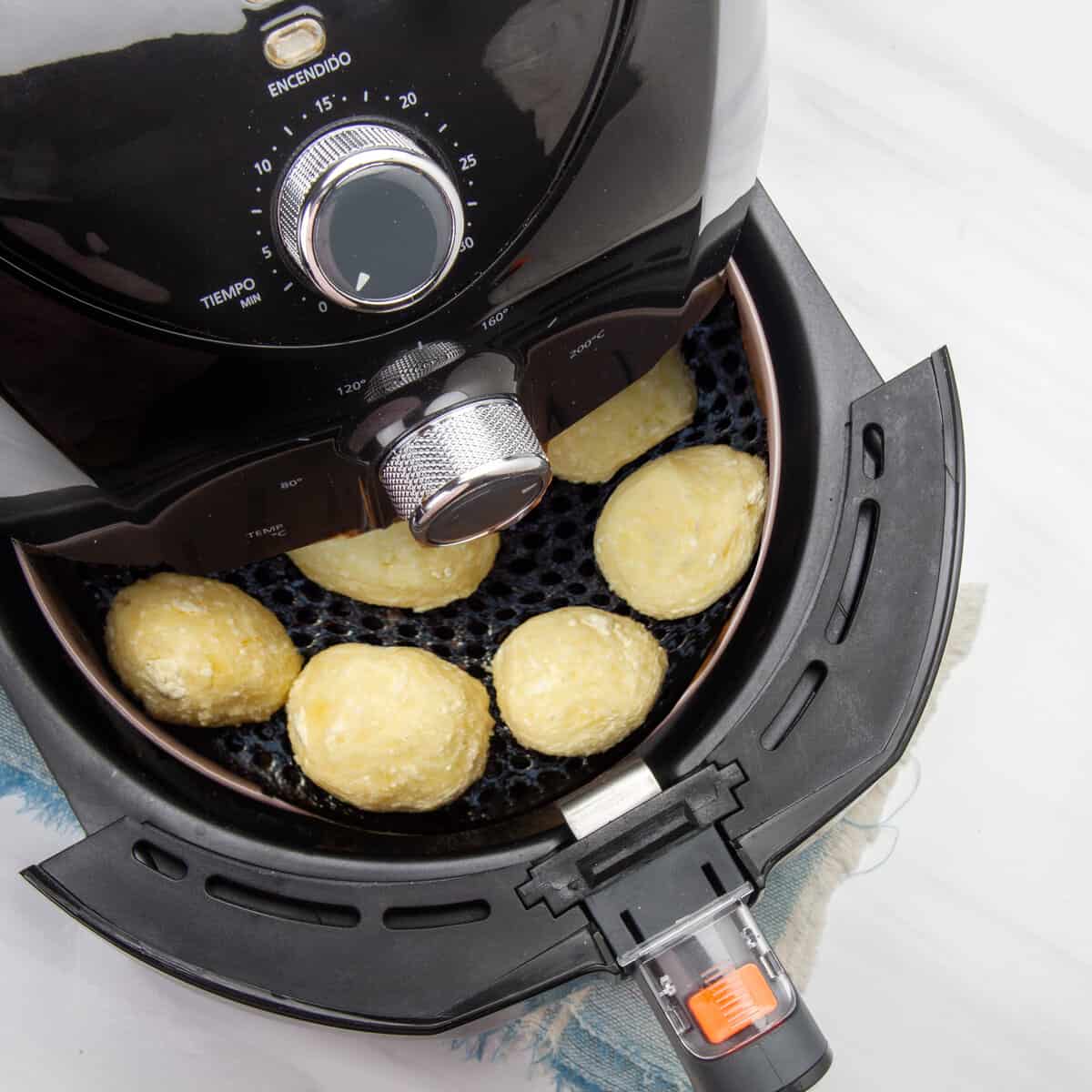 Cook the fritters in the air fryer