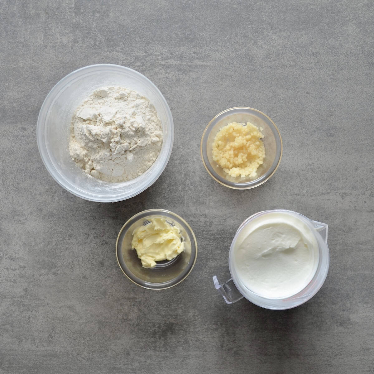 Ingredients for bread dough and garlic butter