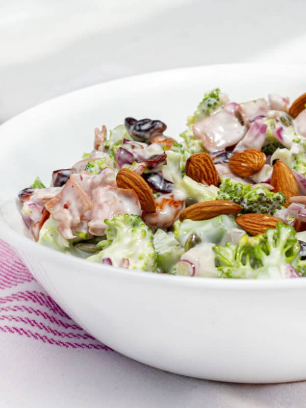 A healthy yet creamy twist on the classic Midwestern broccoli salad with ham and dried cranberries.