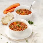 Savory and filling cabbage soup with hearty vegetables and white beans.