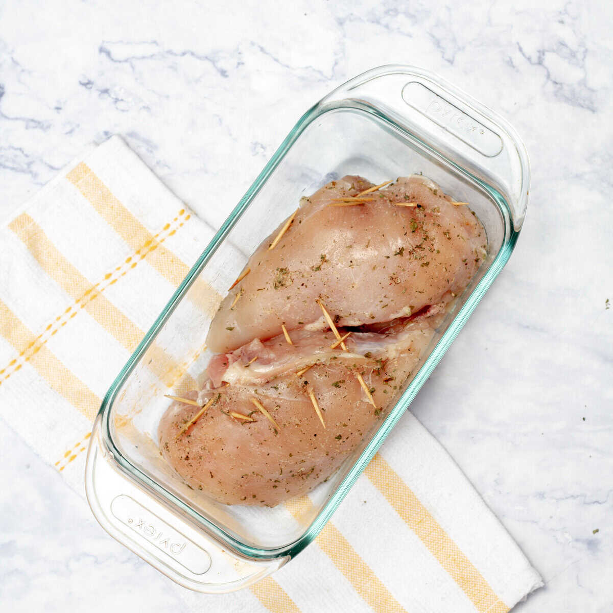 stuffed chicken breasts in a baking dish