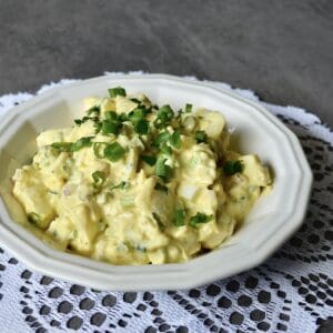 Bowl of egg salad with green onions