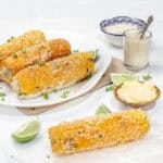 Mexican Street Corn served with yogurt and cheese