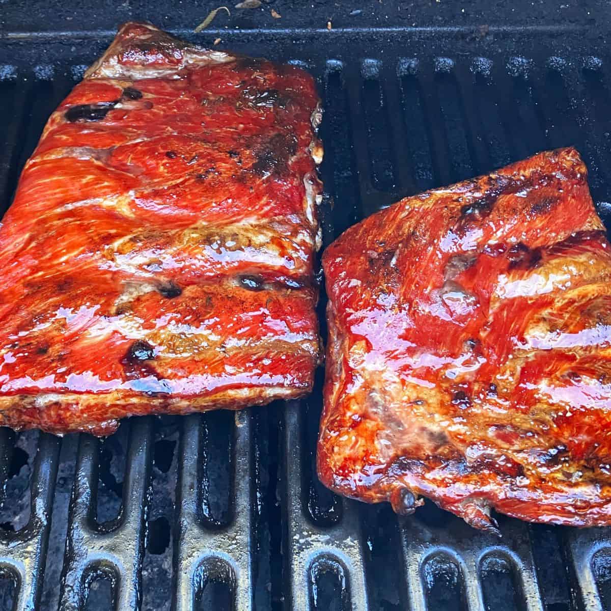 ribs out of smoker and placed on grill to get grill marks