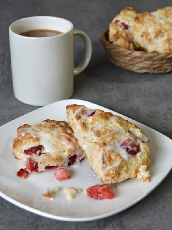 Plated strawberry scones with coffee
