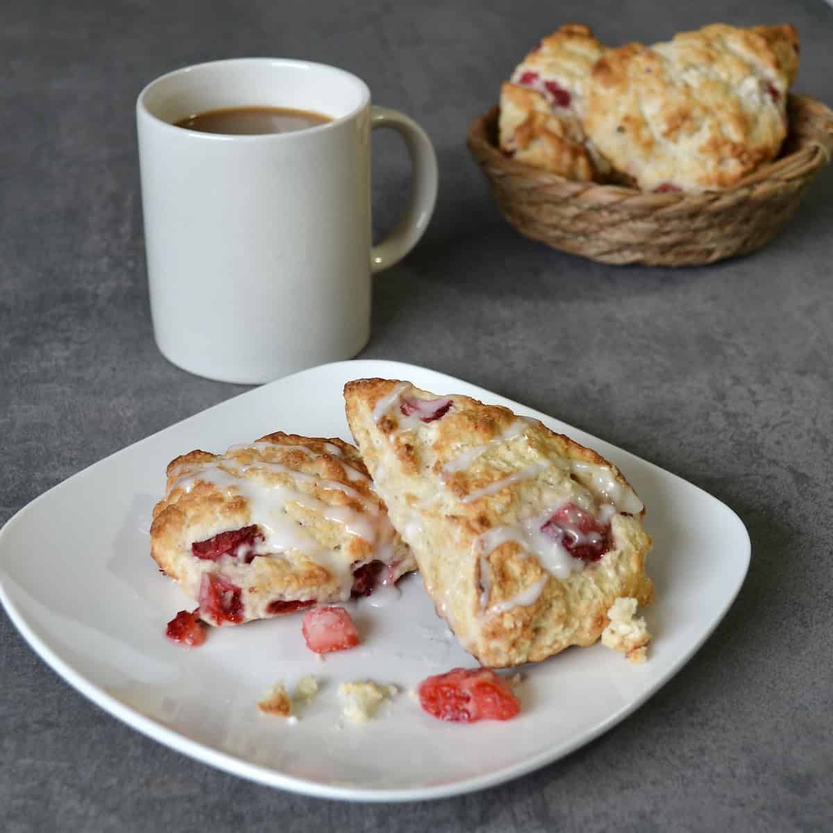 Plated strawberry scones with coffee